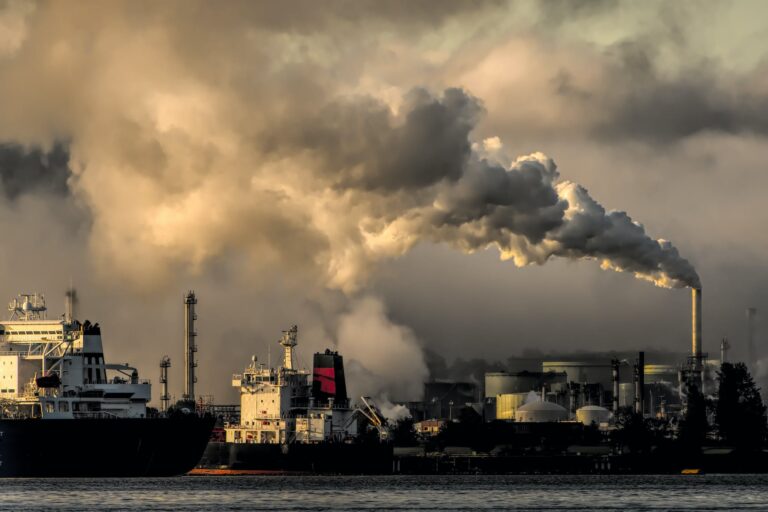 A Smokestack Emission of an Industrial Exhaust Pipes